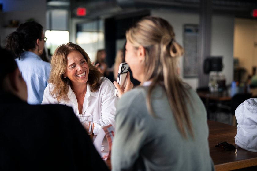 ATHENA members laughing together